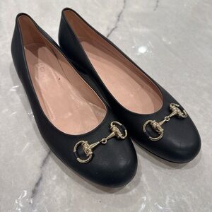 Gucci Black Leather Flats with Gold Accents